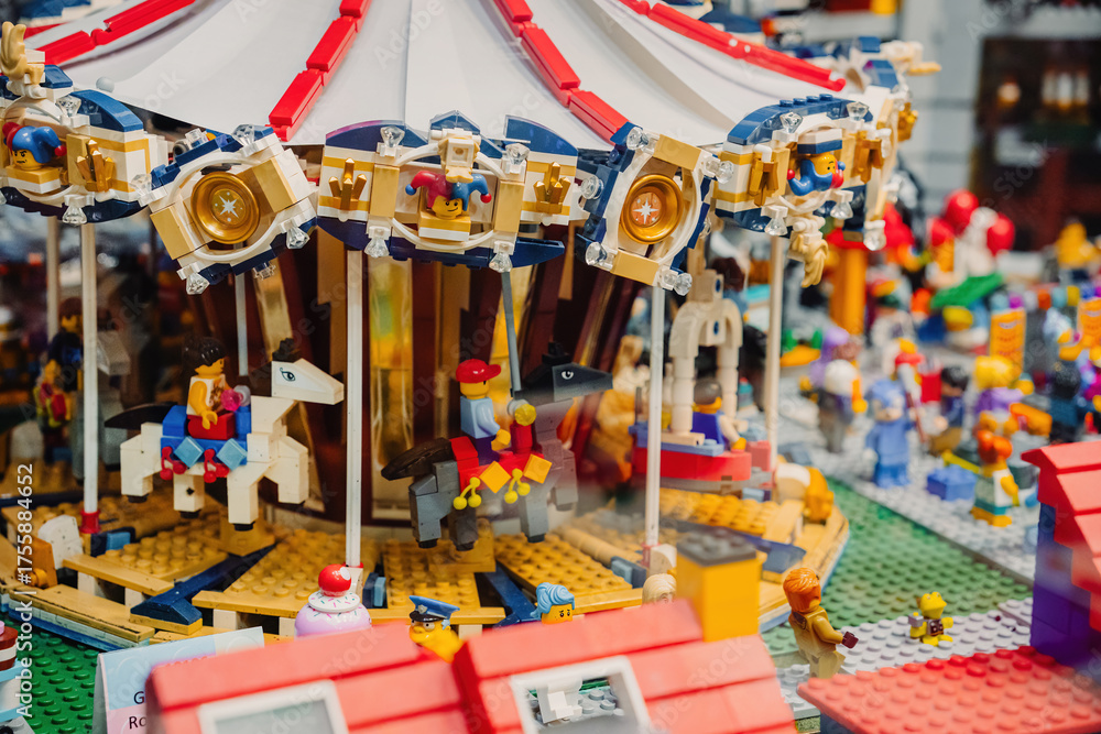 Naklejka premium Prague, Czechia - September 20, 2025: Elegant LEGO French Carousel set with moving horses and charming details