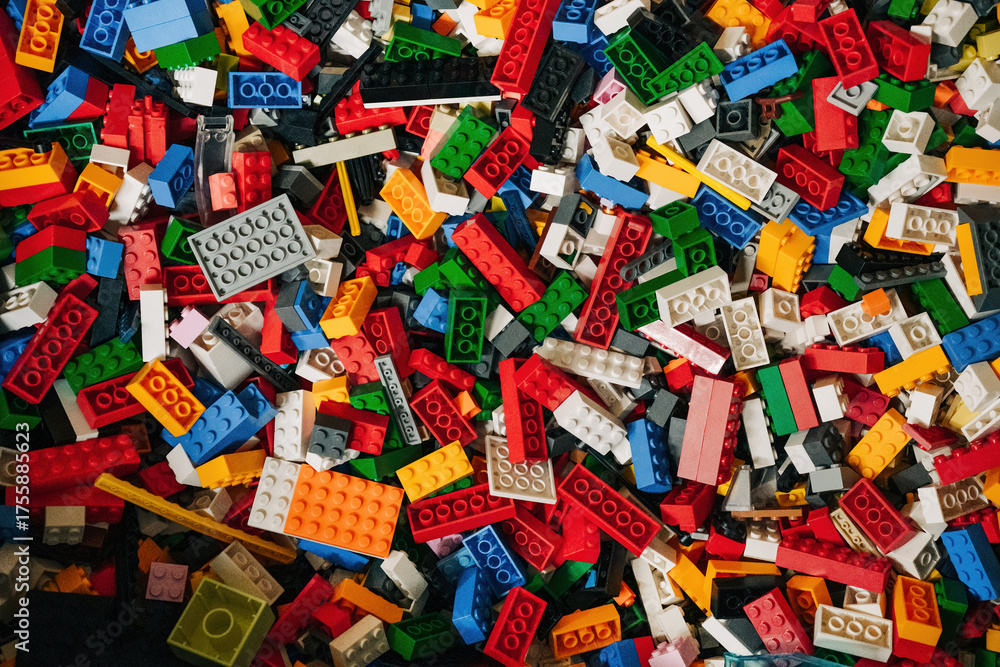 Obraz premium Prague, Czechia - September 20, 2025: Colorful pile of assorted lego plastic construction bricks