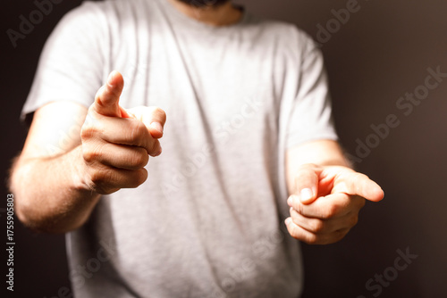 Man pointing fingers at the...