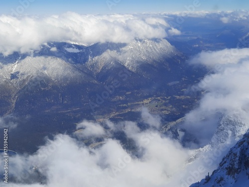 Snow covered mountain top in Austria. View of the Alps from the Zugspitze, the highest mountain in Germany