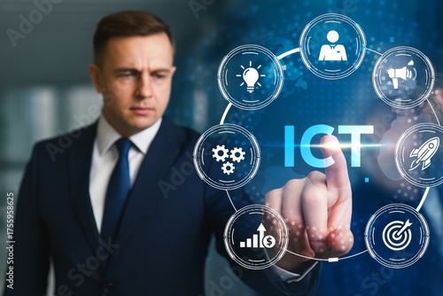 Businessman interacting with information and communications technology concept
