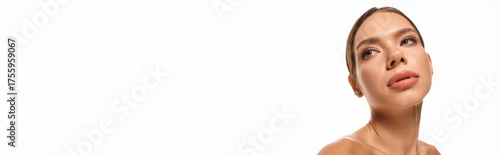 Wallpaper Mural Radiant beauty of a young woman showcasing natural makeup and elegance Torontodigital.ca