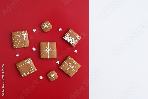 Decorated gingerbread cookies - christmas presents with small sugar snowflakes, copy space for text