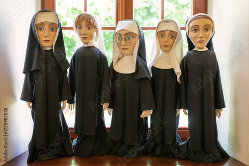 Photos Five doll nuns on the windowsill. Kaunas, Lithuania