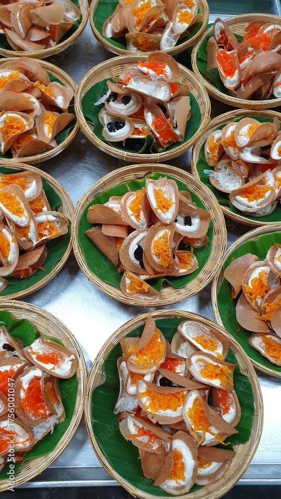 Fototapeta premium Thai Crispy Pancakes in Woven Baskets, Thai dessert, Thaifood.