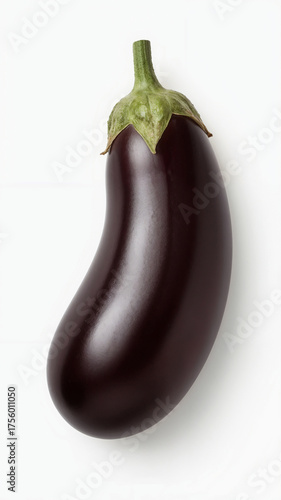 A single, beautiful glossy purple eggplant with a green stem. Vegetable is placed on a plain white background