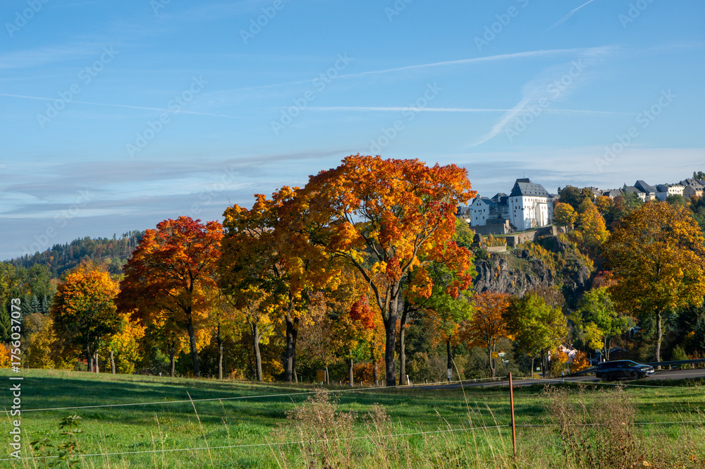 Obraz premium autumn landscape with trees an castle wolkenstein in the Erzgebirge, Saxony Germany