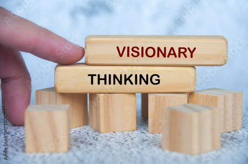 Wooden blocks showing VISIONARY THINKING text for creativity and innovation.