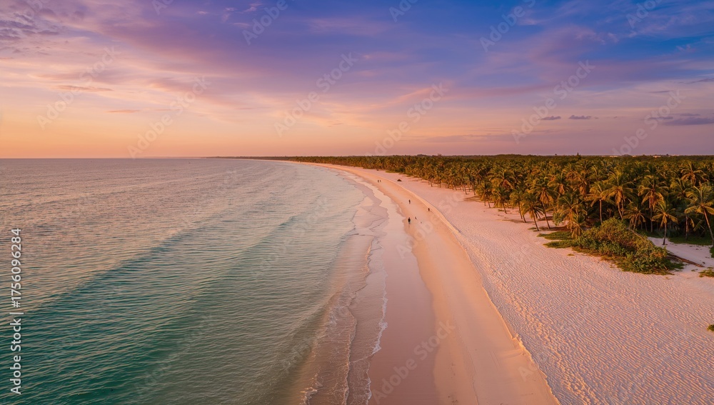 Fototapeta premium Sunset aerial perspective of a coastal stretch with white sandy shores
