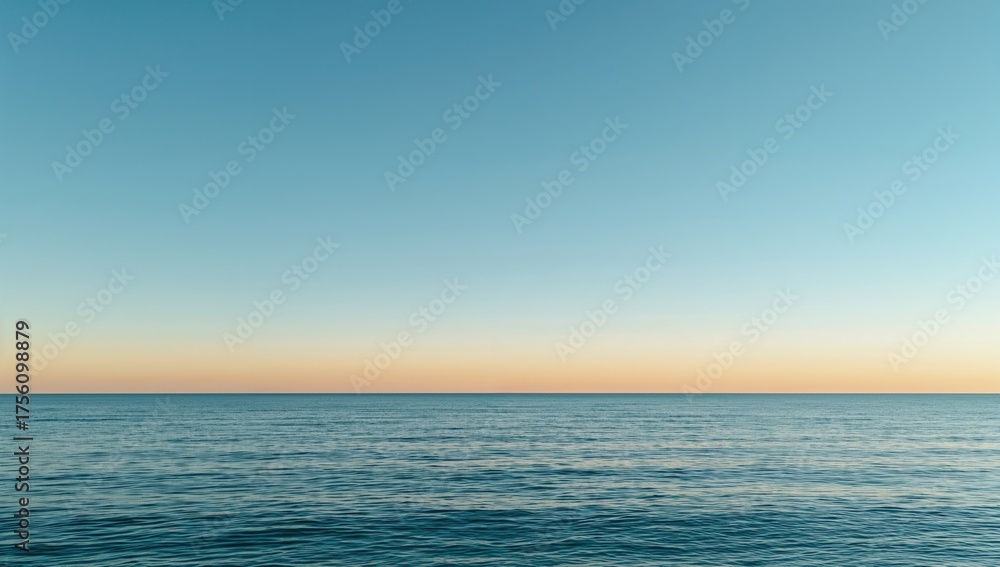Obraz premium Tranquil ocean beneath a clear azure sky