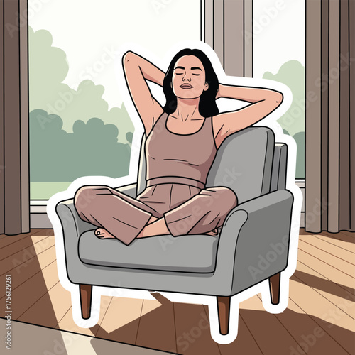 Woman relaxing in a chair with sunlight streaming through the window