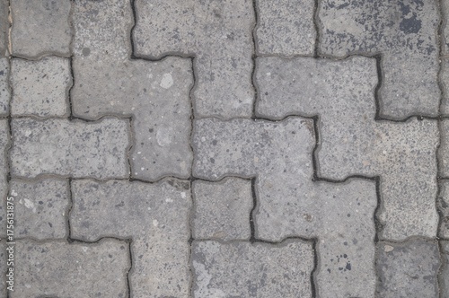 Outdoor gray H-shaped stones for classic walkways, walls, and flooring.