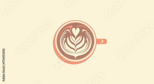 Top-down view of a latte with heart-shaped latte art, in a salmon-colored mug