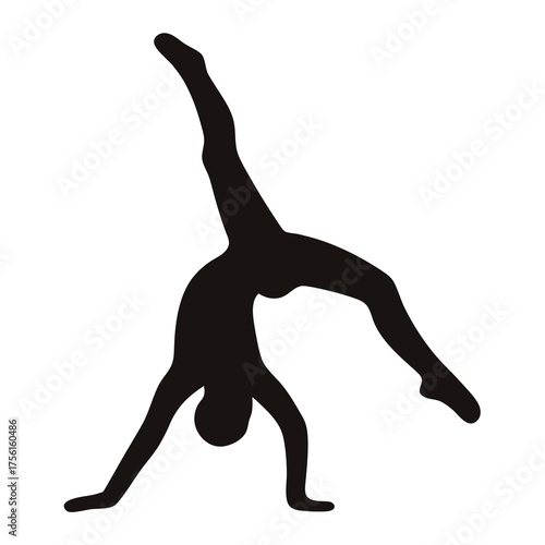 Silhouette of a gymnast performing a handstand with legs in split position