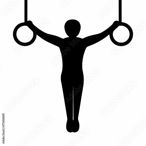 Silhouette of gymnast performing the iron cross on gymnastic rings apparatus