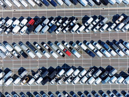 Car parking at the port. Delivery of cars by ship. Cars background. Car parking.