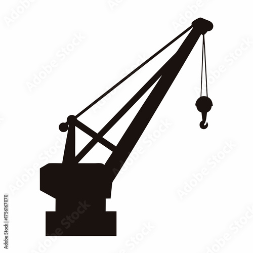 Silhouette of a Crane Lifting Heavy Loads in Industrial Construction Site
