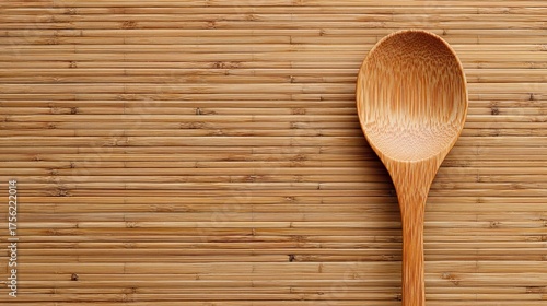 Wooden Spoon on Bamboo Mat Minimalist Kitchen Utensil Natural Colors