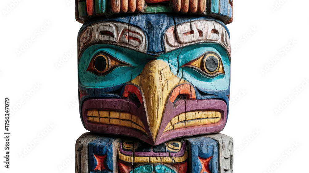 Fototapeta premium Colourful totem pole displaying carved animal figures with traditional tribal art patterns representing heritage culture and craftsmanship isolated on white background