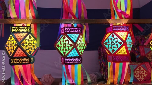 Colorful traditional Lanterns in Various Shapes Akash kandil (Diwali decorative lamps) Hang out side shop for sale celebrating Diwali Festival. stock photo