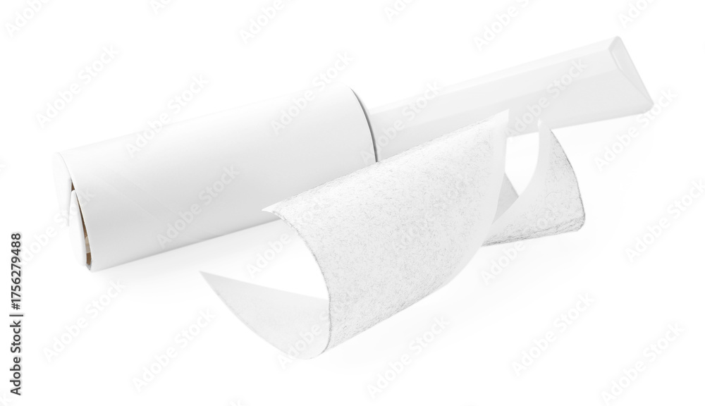 Fototapeta premium Lint roller with used sticky tape isolated on white