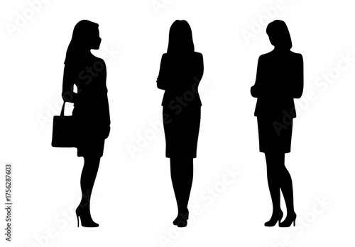 Vector silhouettes of three women, business people standing elegantly in black isolated on white background