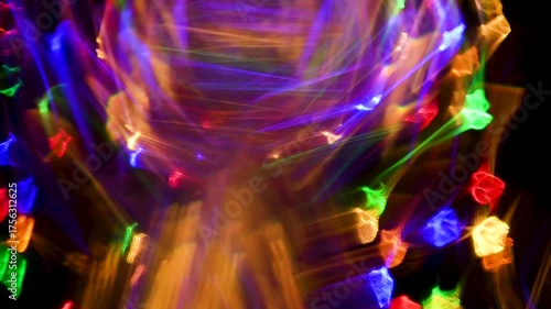 Abstract dynamic background of neon glow lines and spots on dark background. Reflection of human thoughts, neuroprocesses in brain. Circular movement around
