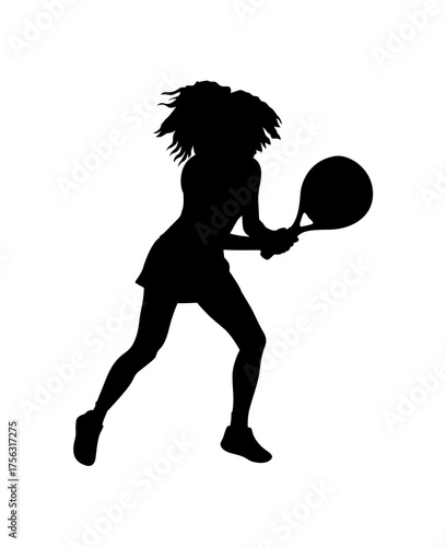 Silhouette of a female tennis player in action hitting a forehand shot with her racket
