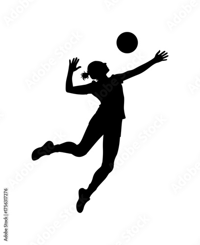 Silhouette of a female volleyball player jumping and spiking the ball during a game