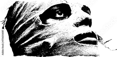 Intense black and white portrait of a wrapped face in high contrast