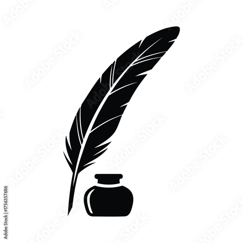 Black quill pen and inkwell