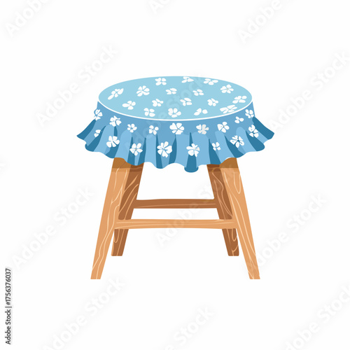 Einfacher Hocker mit blauem Blümchenstoff