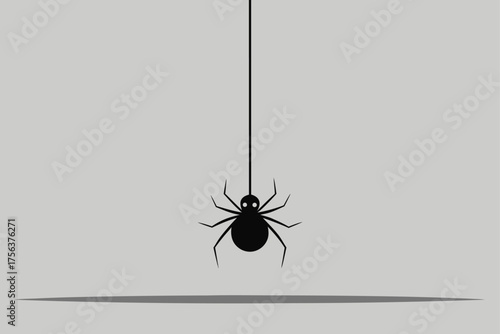 thin spider thread with one small spider hanging f