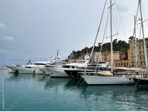 Beautiful view of the white yachts in the seaport on a summer day. Nice. France.