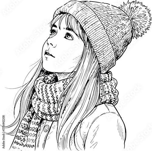 Young girl wearing a knitted hat and scarf looking up at falling snowflakes in a winter scene