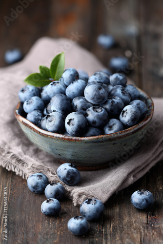 Blueberries in a Ceramic Bowl on Rustic Surface
