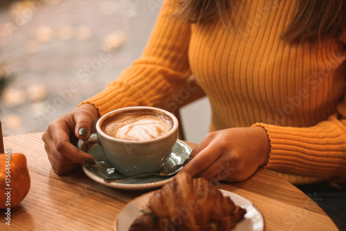 Cup of Coffee and Croissant on Cozy Autumn Morning