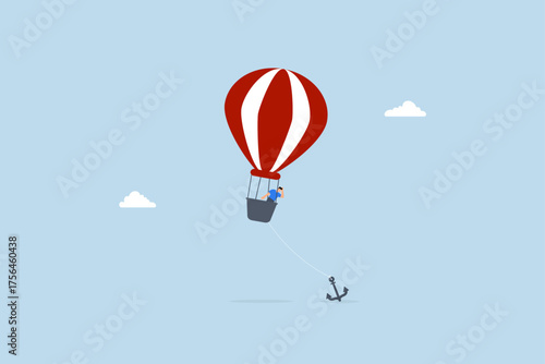 Problem or trouble to prevent business to grow up, exasperated entrepreneur gazes at the heavy anchor holding down his balloon to stop it from ascending