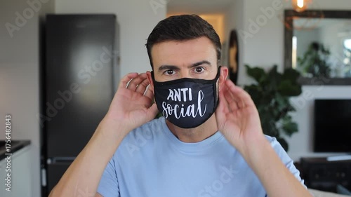 Man with anti-social behavior wearing a mask 
