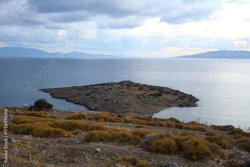 Aerial wide angle view with calm Aegean Sea view during autumn sunset in famous resort town of Bodrum.