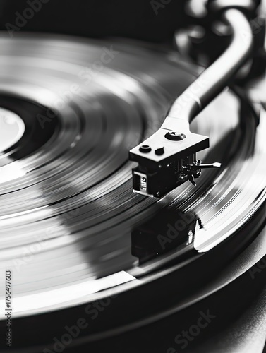 A close-up, high-contrast black and white photograph captures the essence of vinyl records, their grooves etched with sonic stories.