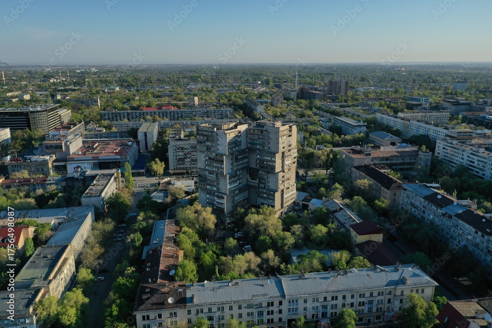Fototapeta premium Aerial cityscape view showing brutalist apartment building