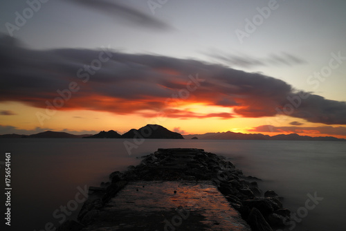 sunset on the beach. Seaside town of Turgutreis and spectacular sunsets. Selective Focus. Long Exposure shoot. tranquility scene.