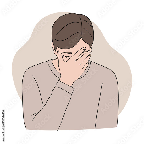 A person covering their face with their hand, expressing feelings of sadness or frustration.
