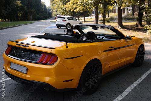 Cuadro en lienzo Modern cabriolet parked on parking lot outdoors