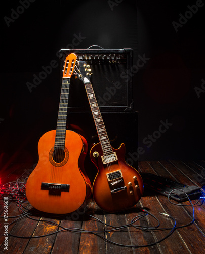 Fototapeta an amplifier and two guitars for background music