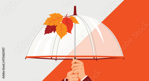Hands holding up a transparent umbrella decorated with colorful autumn leaves against a split white and orange backdrop, symbolizing protection and seasonal change.