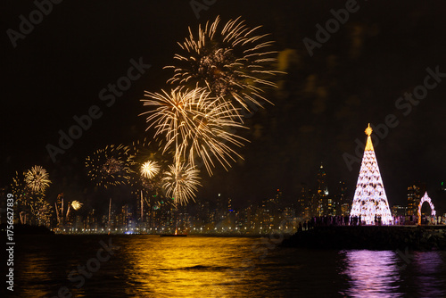 Christmas tree and fireworks on New Year's Eve in Balneario Camboriu Santa Catarina Brazil.