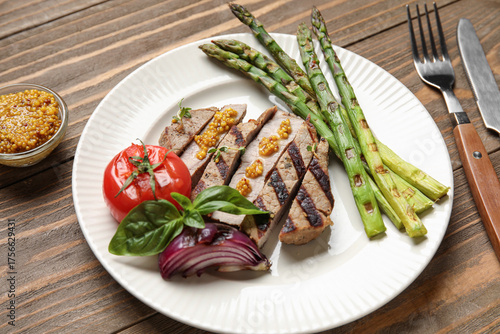 Cut grilled steak with vege...