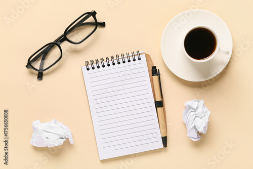 Notebook with eyeglasses, c...